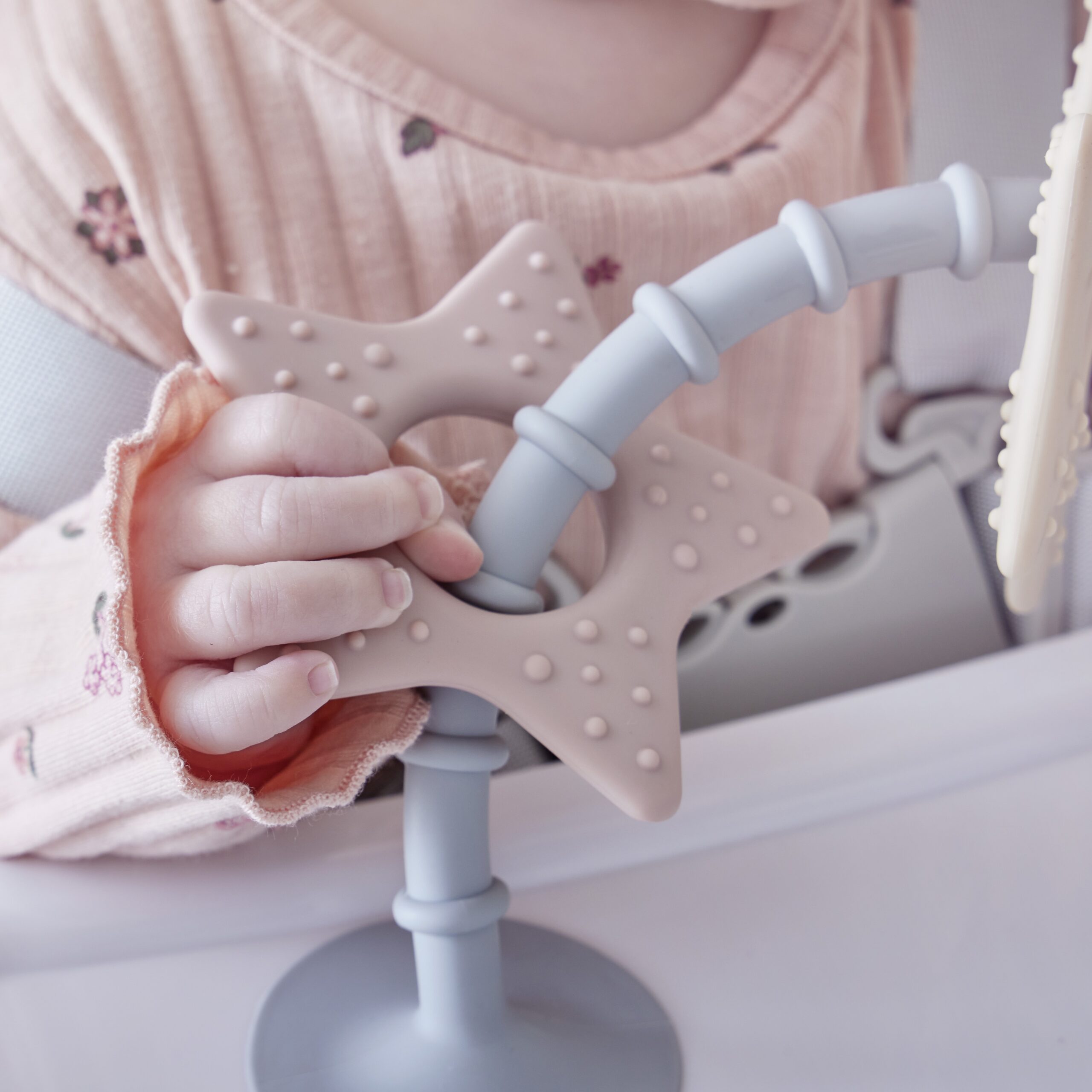 Shnuggle stick n play close up of star being held by girl square